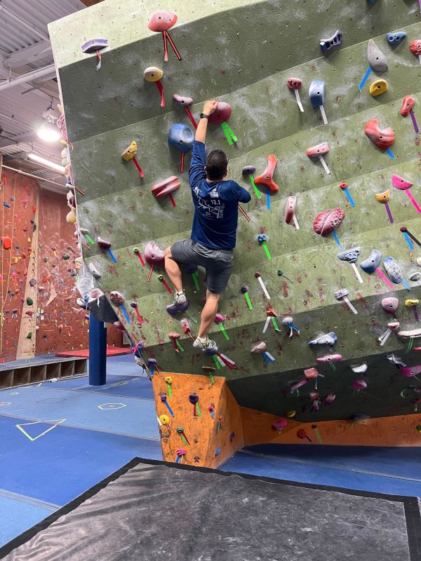 Mike at a Rock Climbing Gym