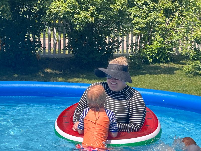 Mary in the Pool With a Friend's Child